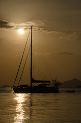 Boat on the sea at sunset in Adang-Ravi Islandsin,Tarutao National Park, Satun Thailand.