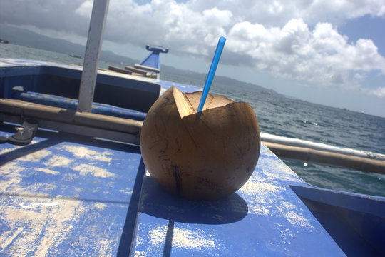coco by the boat, the sea, the island Borakay Filippiny