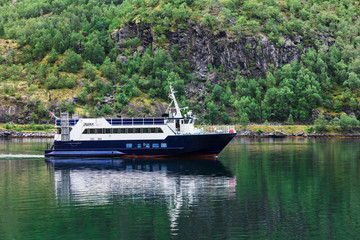 Fototapeta premium small passenger ships in fjord, Norway