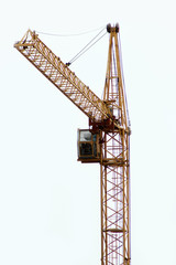 Fototapeta na wymiar Construction crane on the construction site against the sky