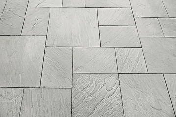 Grey stone pavement background texture