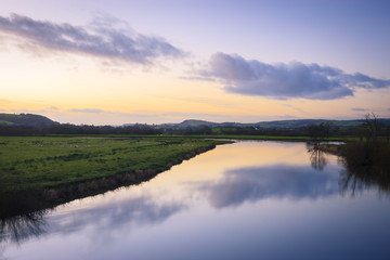 Evening sun over River Towy Carmarthenshire Wales