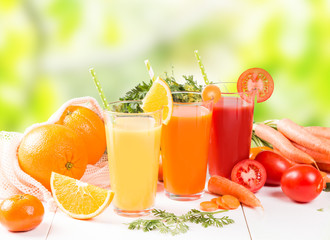 Mix juices, carrot, orange, apple and tomato drinks. 