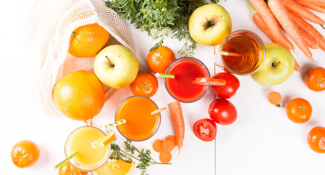 Mix juices, carrot, orange, apple and tomato drinks. 