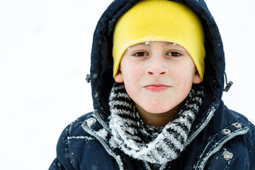 boy in winter snow portrait