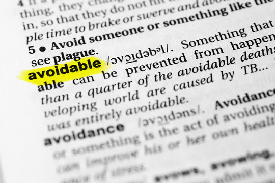 Highlighted English word "avoidable" and its definition in the dictionary