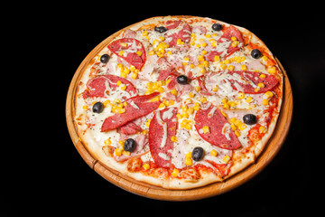 Appetizing pizza on isolated on a black background