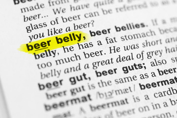 Highlighted English word "beer belly" and its definition in the dictionary
