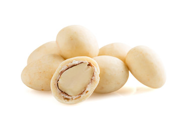 Heap of sugared almonds dragees isolated on white background