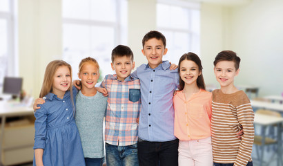 happy students hugging at school