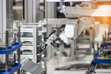 Industry 4.0 Robot concept .The robot arm is working smartly in the production department, the future factory.