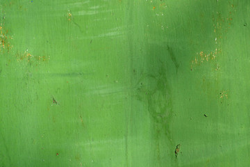Green painted background.