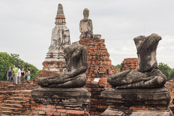 Fototapeta na wymiar Chaiwatthanaram Temple - Ayutthaya Thailand Sitting Buddha - A temple in Ayutthaya In the ruins of the royal temple, which is the most important in the province 