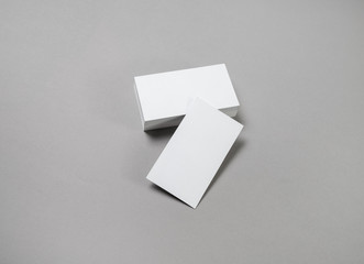 Blank business cards mockup. Corporate stationery set on grey paper background.