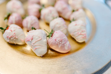 Strawberries in white chocolate at bachelorette party