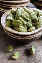 Various whole indian spices on wooden table
