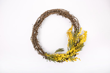 wreath decorated with flowers of mimosa