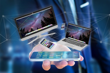 Devices like smartphone, tablet or computer flying over connection network - 3d render