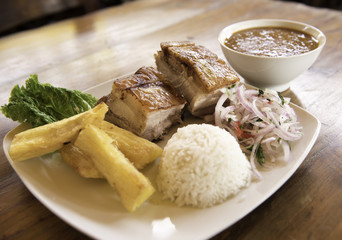 Chancho al cilindro, typical food of Peruvian cuisine.