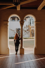 Redhead in Shaded Archways