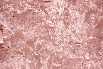 Wall fragment with scratches and cracks