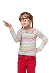 What is this. Indignant puzzled child girl gestures with hand, pursing lips, frowns face in dissatisfaction, isolated over white background