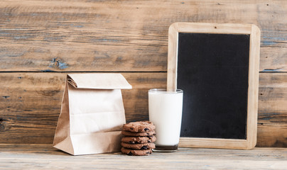 breakfast. glass milk and oatmeal cookies