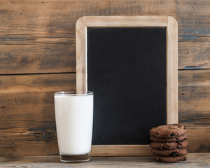 breakfast. glass milk and oatmeal cookies