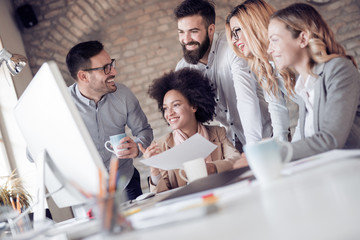 Group of young people working together