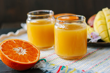 Mango and orange detox juice made from fresh fruits.