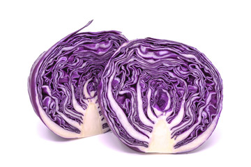 Isolated, studio shot of a head of purple cabbage, cut in half