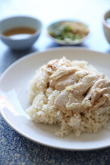 Hainanese chicken rice with cucumber in closeup , Thai food