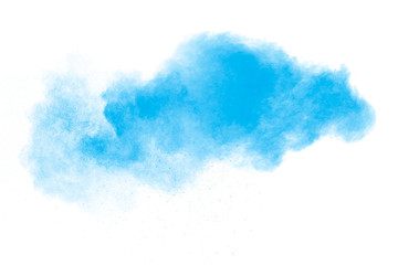 Blue color powder explosion cloud isolated on white background.Closeup of Blue dust particles...