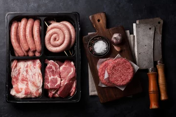 Photo sur Plexiglas Viande Raw meat and sausages