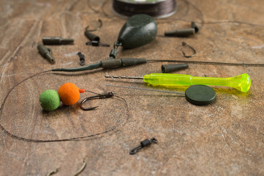 Baits, hooks, sinkers, ledcor is preparing for carp fishing. Copy paste