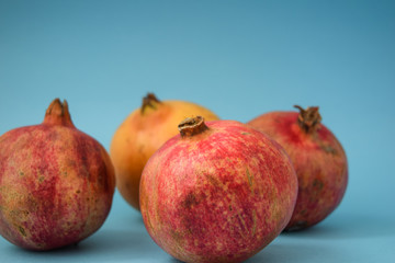 juicy pomegranate on a blue background