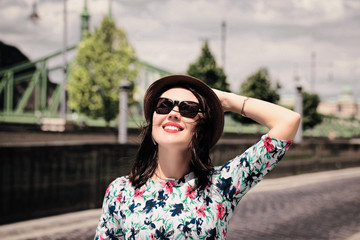 Portrait outdoor of a smiling young woman