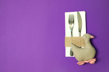 white napkin, knife and fork, place for dinner served in rustic style