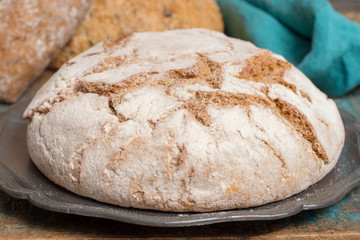 Farmers homemade organic wheat, barley and rye bread in assortment