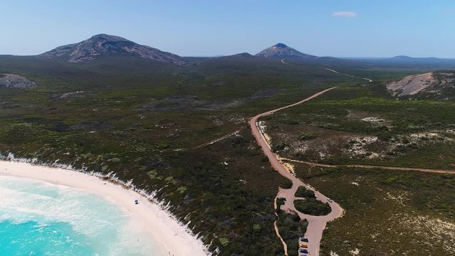 Aerial view of coastline of Hellfire Bay, crystal clear waters of Southern Ocean - Cape Le Grand, Esperance, Western Australia from above, 4k UHD