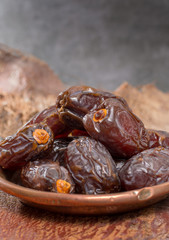 Traditional Middle East dessert, healthy food, big medjool dates fruits.