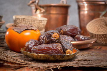 Traditional Middle East dessert, healthy food, big medjool dates fruits.