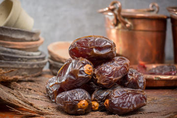 Traditional Middle East dessert, healthy food, big medjool dates fruits.