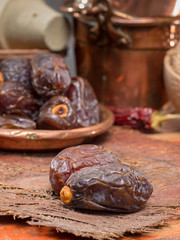 Traditional Middle East dessert, healthy food, big medjool dates fruits.