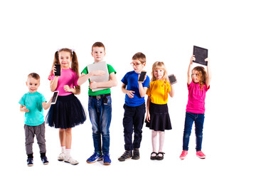 Fototapeta premium The children with gadgets 