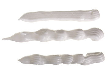 whipped cream or meringue isolated on white background. Top view. Flat lay