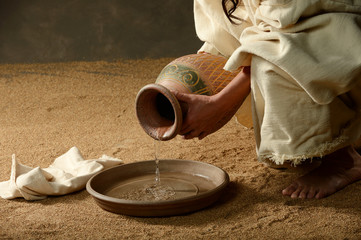 Jesus pouring water