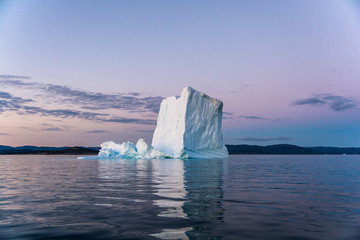 Iceberg in Greenland's white night.