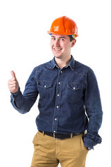 Portrait of smiling repairman (builder) in helmet gesturing okay isolated on white background