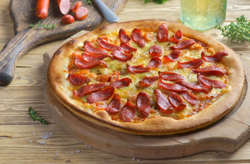 pepperoni pizza on wooden background